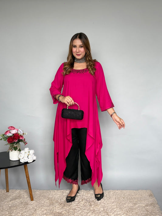 Pink Asymmetrical Embroidered Top With Black Pants